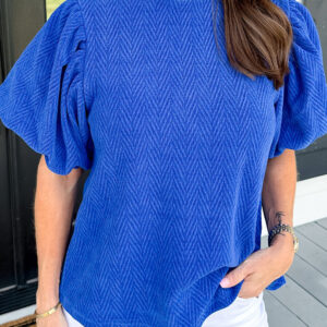 Blusa Azul Celeste Con Textura Manga Abullonada Cuello Alto