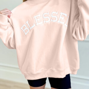 Buzo Rosa Claro Bordado Oversize Cuello Alto