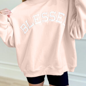 Buzo Rosa Claro Bordado Oversize Cuello Alto